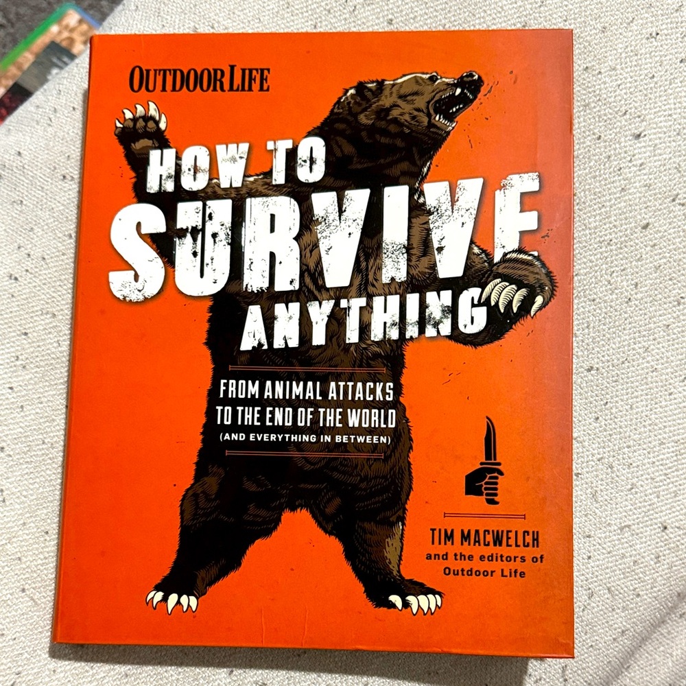 Outdoor Life How to Survive Anything Book - Bold Orange Cover